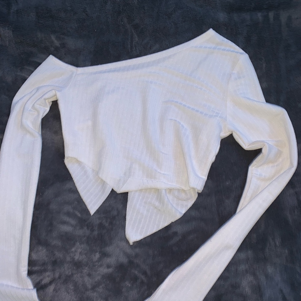 the shirt is kind of sheer and has slits in the front going down sideways